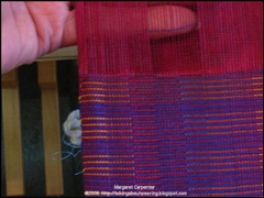 inserting finger to clear warp ends2