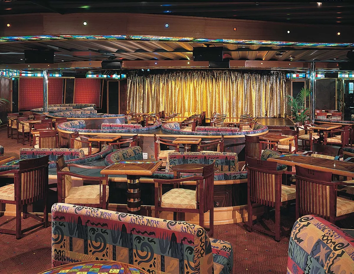 Carnival-Triumph-Club-Rio - The exotically themed Club Rio is located toward the rear of Carnival Sunrise.