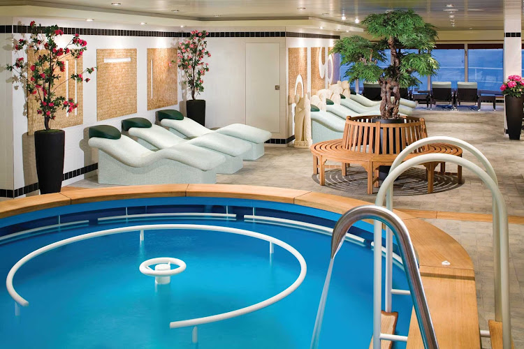 Have a relaxing dip in Norwegian Gem's Hydrotherapy Pool on deck 12. Comfortable lounge chairs also await guests.