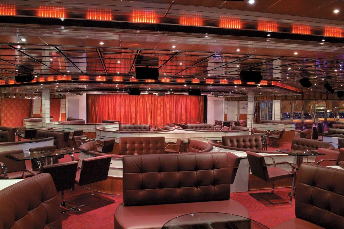 Carnival-Freedom-International-Lounge - When cruising the Caribbean on Carnival Freedom, stop in at the International Lounge for an evening of live music, karaoke and late-night comedy.