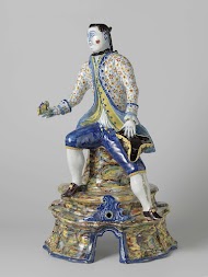 Fontein in de vorm van een zittende man