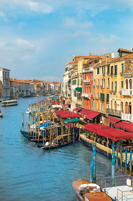 Cafés, hotels and homes along the Grand Canal of Venice.