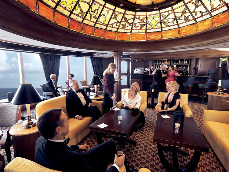 Inside the famed Grills Lounge aboard Queen Victoria, where you can relax, enjoy a cocktail and chat up new friends. 