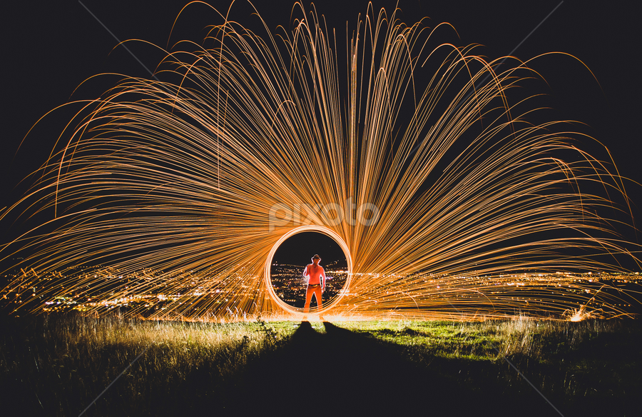 Playing with Fire over the city  by Marius Neag - Abstract Light Painting