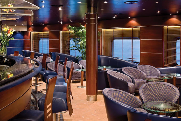 The Voyager Lounge on your Regent Seven Seas cruise offers pre-dinner cocktails in the early evening and later transforms into a lively nightclub.