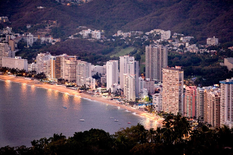 Hotels, resorts and office towers line the beach of Acapulco.