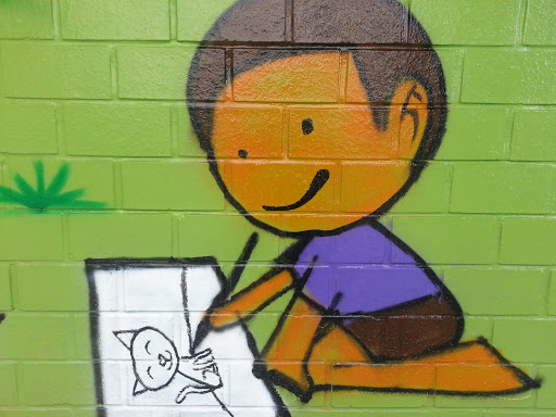 Boy Drawing Cat Mural
