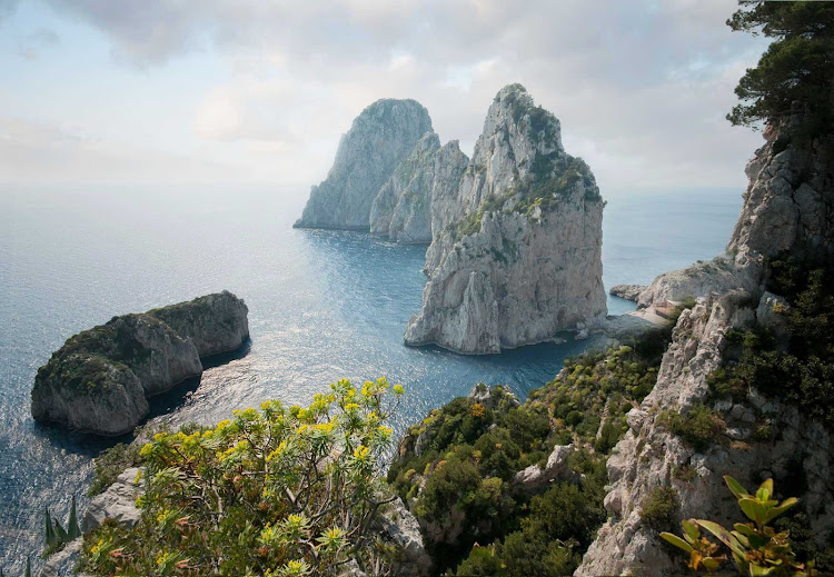The Faraglioni of Capri, Italy, are three geological stacks that have survived earthquakes and landslides.