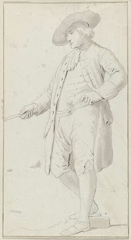 Staande man met hand in de zij